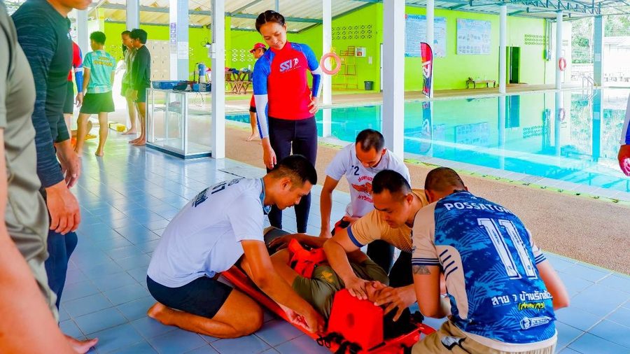Rescue practice in a pool using safety equipment