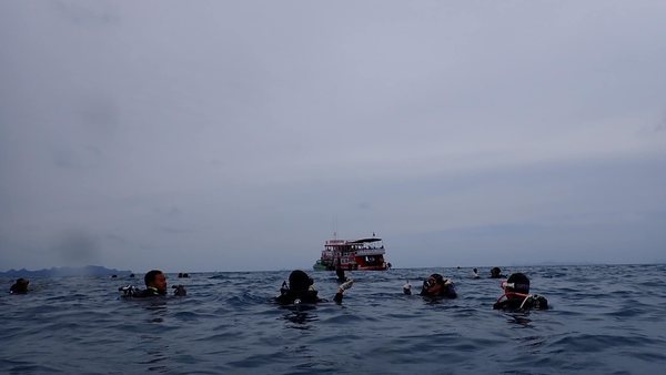 Super Dive Thailand divers preparing for an underwater cleanup