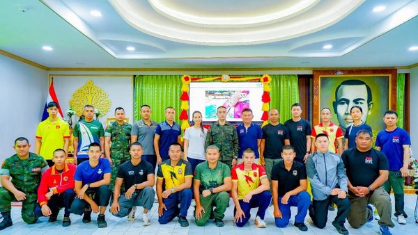 Water-safety trainees and instructors gathered in a classroom setting